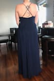 This dress fits so well. Cinched my waist in the right place! Only complaint is -the straps are a little rough and could end up giving you a rash. But with the price of the dress getting that fixed is fine. I'm sure a tailor could add a better strap. - Natalie D.