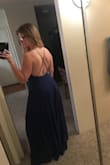 Bought this dress for a friend's beach wedding and it looks great. The extra material on bottom makes it flowy and fun! It does run very long, I had to get it tailored about 3-4" even to wear with wedges. Waist fits perfect and is stretchy, and the adjustable straps make it good for any chest size. I purchased a sticky bra to wear underneath. Picture is pre-alterations/no bra/high wedges on. - Amanda B.