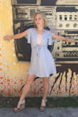 This dress is lightweight and perfect for summer! The sky blue and deep-v neckline are very flattering. This dress fits true to size and comes to about mid-thigh. Pair it with some statement earrings and wedges and you'll be ready to take on a summer day! - Samantha B.