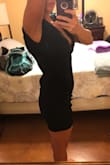 I'm very pleased with this dress. It's cut is just right to be sexy but still classy... The style is flattering and material is also stretchy enough to be comfortable. I probably could have gone down a size but it shortened up just a bit in the wash so overall content with how it fit... Only problem is the zipper bumps out occasionally (see pic). Ordered another color in the same size. - Laura F.