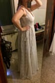 When I go shopping I usually get a large, but I bought an extra large because I live in Italy and didn't want to have to return it because it was too small. Fortunately, I don't need to make any revisions to the top part (unless I lose some more weight). The dress is too long, but I expected that based on the reviews. It is super beautiful and elegant. I'll be wearing it for an intimate wedding ceremony with family. Also, I only paid 15 dollars in shipping and 29 euros for duties. Love this dress! I'm sooooo freakin' happy it worked out!!! - Mallory H.