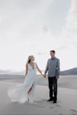I purchased this dress to wear for our engagement pictures because it was white and had a slit. But when it arrived and I put it on, I felt amazing in it! The straps were a little long so I had them hemmed to hold the girls in better and it was long for my short body but that didn't matter because of the setting it was used in. It's fantastic quality and looks far more expensive that it is! - Kristin P.