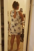 This dress was cute but it didn't seem like the flowers looked good on this dress. The facility was nice but I just didn't like it too much. - Andrea F.