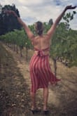 I first wore this dress to dinner and got two compliments right away! The cut is super flattering and the slits and tie top offer just the right amount of skin. It was perfect for a fun summer day wine tasting. - Jasmine L.