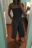 I really love this jumpsuit! I bought it to go out to dinner and it is perfect to dress up or dress down and wear casually. I'm pretty short so it's a little longer on me than the model but still looks great. I got lots of compliments. Additionally....it has pockets!! - Bryelle C.