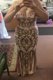 This dress fits like a glove! The stretchy material hugs all the right spaces. I will be wearing this to my wedding after party! I had to get the bottom hemmed a few inches, but once that was done, it is perfect. Takes two people to zip up though! - Katy G.