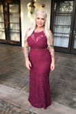 This dress was beautiful and fit perfectly.  I wore it to my best friends wedding. I'm usually about a size 10 and I ordered a large and it fit amazing and hugged my curves beautifully. It is long but I'm short so that's normal I wore a 5inch heel. Not a lot of stretch. Made well. The color is more in the darker purple/red/burgundy's. Truly a stunning dress. - Crystal