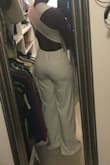 I have long legs and a curvy bottom half.  This jumpsuit is long enough for me to wear heels and fits almost perfect!  I am tempted to order more colors!  I usually wear a size 8 or 10 in pants and have to have a long inseam.  You won't regret this purchase. - Tiffany S.