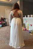 The dress is gorgeous! I was planing wearing on my wedding but it was too long on me and the back part didn't fit good as I expected. - Erika D.