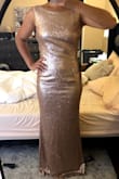 I bought this for my cousin's wedding as the Maid of Honor dress in the matte rose gold. I got it while it was on a summer sale so the price was great! 

I ordered a size S basing my choice on the measurements provided and some reviews. It arrived quite promptly but unfortunately it was a bit snug. I called customer service to exchange this for free to a size M and it fits beautifully. The price had gone up by the time I returned it and after some back and forth, the customer service rep honored my original price. My free return, exchange, and arrival of my new dress took less than 5 days...incredible! 

 I love this dress. It's comfortable and fits well. The only downside is that the sequins fall off so they are sprinkled around my house now. Luckily it has sequins all over so some missing ones would go unnoticed. - Samantha Y.