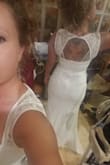 Bought this as my reception dress (my wedding dress is a lot bigger and wouldn't be comfortable to wear all night)...this dress is perfect...very comfy and still flattering. And I can still wear a bra in this style to hold up the girls! I'm pretty curvy but still very petite and I am wearing 2.5 inch wedges under this dress. Will need to hem but it's a great purchase. - Jessica B.
