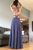 This dress is amazing but it's not a grey color. Photo will provide down below. - Daria H.