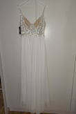 Amazing dress! As pictured. Was a little big on me, but I will tailor it to my own size as I am using it for my wedding, as a second (night) dress. - SynnÃ¶ve G.