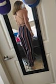 I'm 5'6" tall and this is long on me -- stepping all over it. With shoes it's not as bad, but i definitely need platform shoes with it. It's super cute, I haven't worn it yet and am not sure what I'd wear it to.. so i'm not sure if i'll keep it. It's cute but definitely seems a bit fancy for daily wear! - Emily T.