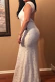 This was the 3rd dress I ordered during my search for the perfect dress.  I chose this dress for my Vegas wedding and it gave me the exact look I was going for...classic, elegant, beautiful & sexy.  I probably would have been a Large, but only the XL was in stock.  It ended up fitting just fine.  A little loose in some spots but I was comfortable. - Alexis P.