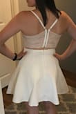 Love it!! It's a thicker material so it holds up nice and isn't see-through at all. The back lace is very flexible and the fit is phenomenal. I  can't wait to party it up in it at my bachelorette next month! - Cara O.