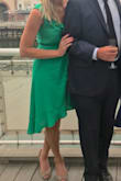 I am tall and slim I ordered a size small it fit perfectly! Definitely need fabric tape or a pin to keep closed along with the tie. I would be ok nervous without it. - Laura K.