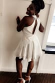 I wore this for my bridal shower and I received endless compliments! I felt gorgeous! I love the fabric and the fit. The only thing I will say is the back was a little loose and not as tight as I would've liked, but the zipper part in the waist fit nicely. - Desiree W.