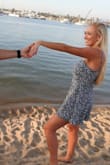 This dress is cute and flirty. It's the perfect length and not too short which I struggle with because of my height. My now fiance proposed while I was wearing this dress so I can't say a bad thing about it! - Brooke P.
