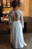 This dress had a lot of potential, it ran large and made me feel boxy. The material and zipper felt very high quality but the shape did not do my body justice. The length was great though, plenty of room for heals! - Samantha G.