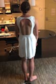 I loved this dress! I was looking for a courthouse wedding dress, this was a little too casual for me but I would have loved it for another event like a shower! The fabric was very nice quality and the back makes the dress! It fit a little loose in the torso but that may have been because of the open back. The length was perfect for me, even with my height! - Samantha G.