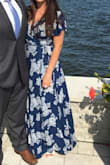 Loved the dress. I have a smaller waist line for my bra size so it really worked well with the tie waist. It wasn't too revealing. The only issues I had was I was at a party outside and it was a bit windy, so just mind your dress blowing to the side. Shoes are also from Lulus! - Cara S.