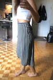This is one of my best purchases at Lulus! The material is super light and stretchy, the slit is perfect. I can't wait to wear this skirt out! It looks great with a white crop top!

Update: I've had this skirt for a year and even after many washes it still looks amazing. One of my best purchases at Lulus. - Marie-Philip M.