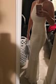 I ordered this dress for my wedding in October and it fits like a glove. It's perfect and looks even better on a curvy person like myself - Jamie K.
