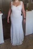 I bought this dress in a whim while looking at wedding dresses online. Lulu's has a decent return policy so I figured I had nothing to lose.  I just received the dress and it's perfect. Good quality, fits well without shapewear, a little stretch so will be good for dancing. For my height the length is perfect with heels. I'm going to wear flats so I'll have the front shortened just a bit. Can't wait for my wedding! - Caitlin S.