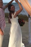 Wore this as my beach wedding dress. Photographs perfectly! I ordered a small and it fit. Was a little tight over the ribs but would not order a size larger. - Brian A.