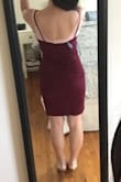 I really like this plum color! The dress is figure flattering. I like that the fabric is thinner but not too thin. The length is about 2-3 inches too long for me since I'm only 5 feet. It's hard to find nice stylish dresses in store like this for short people so I'll take what I can get. Good for a night out or a wedding. - Michelle N.