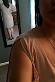 I'm usually a L and wanted to err on the larger side to make sure it was long enough so I sized up - so glad I did! Cute dress with good fabric that's easy to dress up or down. Hides the tummy area well which is desirable sometimes but conversely it lacks any shape and can end up feeling like I'm wearing a nude pillow case. - Ginger P.