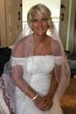 It was perfect for my wedding day. The sleeves were slightly restricting,  otherwise absolutely perfect! Great fit and I felt beautiful! I received a lot of compliments on the dress! - Christina S.