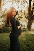 Loved this dress. Got it for my maternity pictures, so it was a little snuggly, but SUPER stretchy. Can't wait to wear it post baby. - Michelle H.