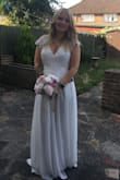 This is the 2nd dress I've brought from lulus and the quality is amazing for the price you pay!! The dress does seem a bit snug on the waist and also quite long and I will need to take it up as I'm not wearing shoes on my big day. The pattern on the back is such an eye catcher as well which makes the dress look even more stunning! - Kristina C.