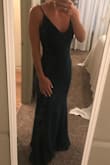 This dress is so beautiful. It runs true to size and is made of a fabric that is just thick enough to hide any flaws. It is fairly long, but with heels it is perfect! Can't wait to wear this to the black tie wedding I am attending. - Charity J.