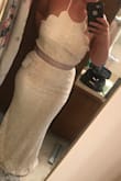 So much better than expected! The material is gorgeous, thick and heavy. To me, it feels like a real wedding dress and it fits so perfectly. I did not expect it to look so good on me. I ate a little too much banana bread today so it was kind of tight in the stomach area but a few salads over the next three weeks and I will be just fine. Phenomenal dress there is a reason it is reviewed so high. - Ashley I.