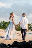 We decided to elope in Hawaii and I didn't have guests or anything for this, our 2nd wedding each.  So it was going to be simple, somewhat casual...but I still had a craving for a little chiffon train and I found a used designer dress on Ebay that was like...size 0000.  Um...not gonna fit me...ever.  So instead of just throwing it away, me and my tailor snipped off the train and did this fantastic overlay on top of the Oceans of Elegance dress.  Two fit issues easily worked around: the bodice, like another reviewer mentioned, is just a bit tight around the ribs and it's kinda tricky to zip up without hurting yourself, but it provides great support once on, and is plenty comfy.  The cups have a deep V but it still looks classy.  I had to have the straps shortened a bit.  Take a look at my pics!   It was a stunning gown. - Michelle P.