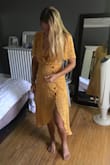 I loved this dress and really wanted to make it work but the chest was super big on me and looked funny when I tried to pin it. Will be returning unfortunately:( I don't think I could have sized down because it fit my waist perfectly - Monique S.