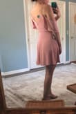 There are darts in the breast of this top, so smaller chested girls may have a hard time filling it out without the front sagging. I was going to return it but I may give it to a friend. The color also did not compliment my olive skin tone too well. Still a very pretty dress. - Sarah B.