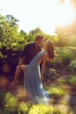 The dress was great for my engagement shoot, the skirt had lots of movement with the layers of fabric and the slit in the side. The only thing I would mention is that the blue is a paler blue in person compared to how it looks in photographs. - Katherine O.