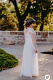 This dress fit like a glove, with the exception of the height. Luckily, my grandmother is an accomplished seamstress and was able to take a good foot off the bottom of the skirt and take up the shoulder straps. I wore this dress for my brunch garden party wedding. Highly recommend! - Ellen A.