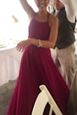 I ordered this dress in magenta for an Aug wedding and received tons of compliments! I'm a tall slender frame and I wore 3 inch heels. The dress fit perfectly. - Tabitha S.