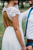 After looking for so many options and reading a lot of reviews to find the perfect dress for my outdoor wedding, I found this dress beautiful, it was the best one that fitted regular people (Pictures posted by customers are the most helpful). I got it really quick and was love at first sight. It was a little bit long, but I didn't care (not time for cutting it). To my waist was a little bit tight, because I am a little bigger that I normally are, but wouldn't go a size bigger since the top part was exact for my breast size. - Sara A.