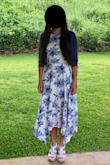 This is my second Lulu's dress and I was not disappointed. I am only 5'2" so even though this is a midi dress it is a bit longer on me. I love it. It's the perfect summer dress and I get so many compliments whenever I wear it. It looks especially great with white heels. It fits perfectly and I love the zigzag hem and crochet detailing. It is pricey but it's good quality and worth it. - Jessica N.