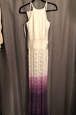 We ordered this dress to serve as a wedding dress in a styled shoot. We ombre dip-dyed the bottom purple. Everything was absolutely perfect. It fit the model like a glove and she typically wears a size 3 or 4. It was a little long if you wear it with flats, but it was perfect with heels for her height. I couldn't have been happier with the purchase. - Kayla D.