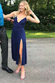 I am smaller in the chest so I had to wear double sided tape to keep everything in place, you may get away with wearing a strapless bra but I just went with petal covers. I wore it to a wedding and got a lot of compliments! It has two slits in the front of the dress which is perfect for dancing. - Jasmine