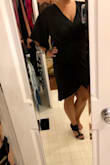 I bought this dress to wear to the opera or ballet when I go to Europe next week. The dress fits great. It hugs your curves. I love that the vest is v-neck but it has enough material to cover your chest. I love the draping on the front of the dress it hides any imperfections but adds some sexyness to it. There is a slip underneath so you don't accidently flash anything. I didn't like that it was a washed black it just made it look like it was and older dress; like it had been washed too many times. I like the sleeves in the picture but did not like them on me. I did return the dress as I wanted something that looked a little more formal. - Brandy S.