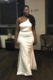 I bought this dress from Australia and it arrived within two weeks. Bought a large as I wear an Australian 12. The dress was a little loose but still beautiful. Such great quality for the size. - Rutendo M.