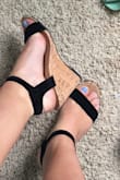This shoe has a wonderful fit! Slips on like a slipper and the strap is almost like a nice velvet! Although this shoe is a tiny bit to small they are easily able to be worn for a long time! The white seemed to be the popular color in this style but the black is super nice and sleek look! - Elle C.